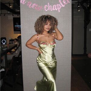 Elegant Green Satin Dress with Floral Accents